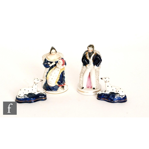 1 - A pair of 19th Century Staffordshire figures modelled as Queen Victoria with a baby on her knee, and... 