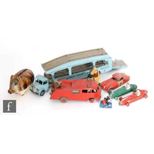 482 - A collection of diecast models, to include a Salco Mickey Mouse pencil sharpener, circa 1949, a Dink... 