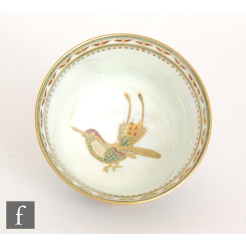 83 - A 1930s Wedgwood 'Ordinary Lustre' footed bowl decorated in the Z5088 pattern with exotic birds in f... 