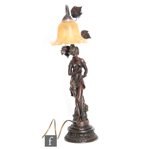 756 - A replica bronze table lamp and shade depicting a semi naked female holding her skirt, height 60cm.