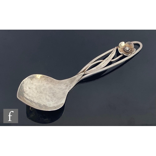 494 - An Arts and Crafts Australian Sterling silver spoon, hammered bowl rising to a pierced handle with f... 