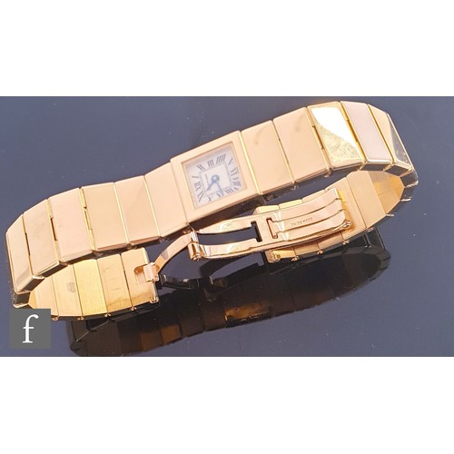 717 - A lady's 18ct gold Cartier quartz bracelet watch with Roman numerals to a square dial, case width 14... 