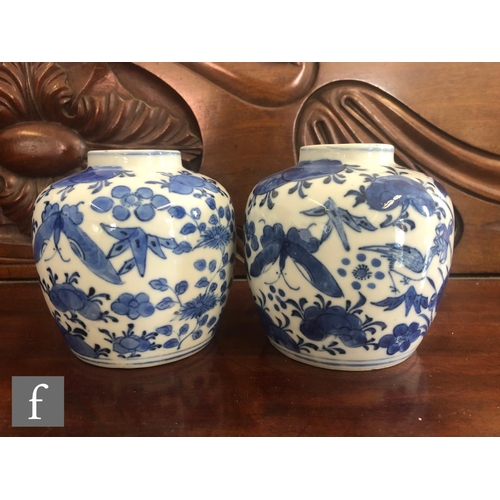 199 - A pair of Chinese blue and white vases, late Qing Dynasty (1644-1912), each of rounded ovoid form de... 