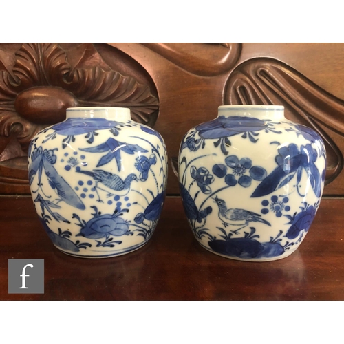 199 - A pair of Chinese blue and white vases, late Qing Dynasty (1644-1912), each of rounded ovoid form de... 