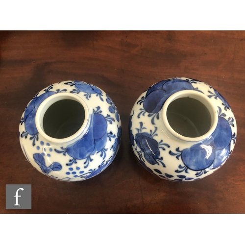 199 - A pair of Chinese blue and white vases, late Qing Dynasty (1644-1912), each of rounded ovoid form de... 