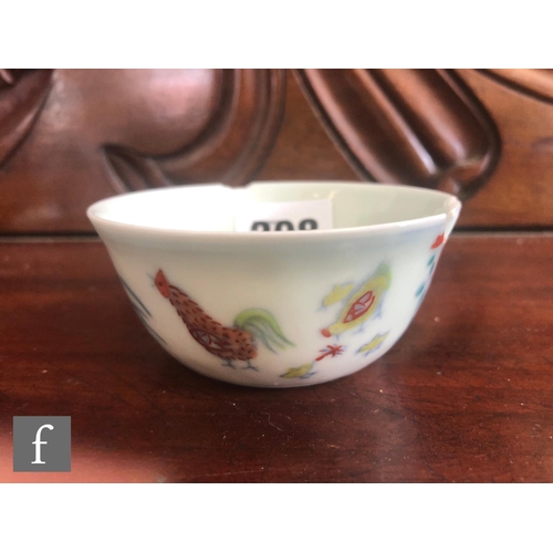 208 - A Chinese Ming Dynasty style 'Chicken cup', the gently sloping sides decorated with Doucai glazes an... 