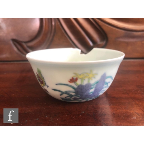 208 - A Chinese Ming Dynasty style 'Chicken cup', the gently sloping sides decorated with Doucai glazes an... 