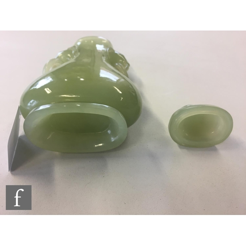 193 - A Chinese 20th Century green hardstone vase of pear form mounted with two ring drop handles below fi... 