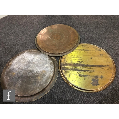 207 - A collection Middle Eastern/Persian brass trays,  to include two plain rimmed examples, with foliate... 