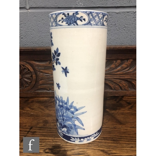 216 - A Chinese late Qing Dynasty (1644-1912) blue and white sleeve vase of cylindrical form, the body pai... 