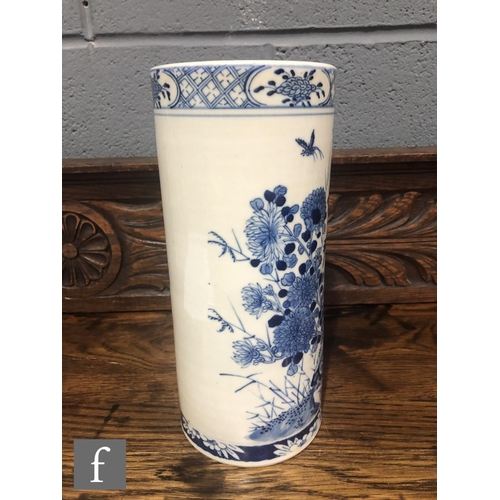 216 - A Chinese late Qing Dynasty (1644-1912) blue and white sleeve vase of cylindrical form, the body pai... 