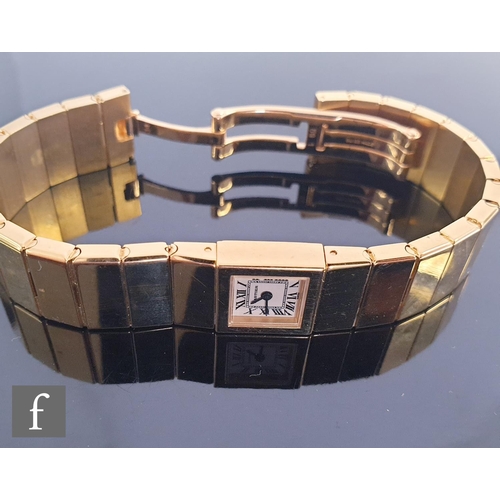 717 - A lady's 18ct gold Cartier quartz bracelet watch with Roman numerals to a square dial, case width 14... 