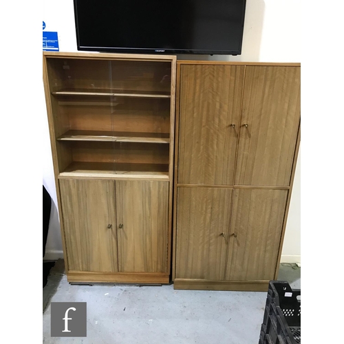 947 - A 1950s 'Cumbrae' walnut veneered modular cabinet system, designed by Neil Morris for Morris of Glas... 