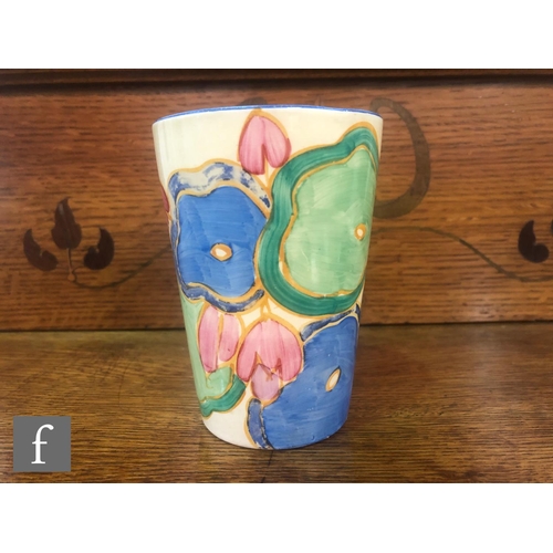 26 - A Clarice Cliff Blue Chintz pattern lemonade beaker circa 1932, hand painted with stylised flowers a... 