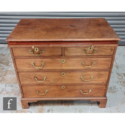 958 - A mid Georgian mahogany bachelor chest of drawers with upper brushing slide above two short and thre... 