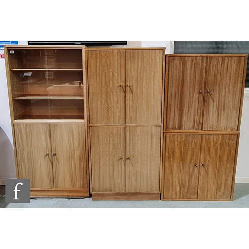 947 - A 1950s 'Cumbrae' walnut veneered modular cabinet system, designed by Neil Morris for Morris of Glas... 