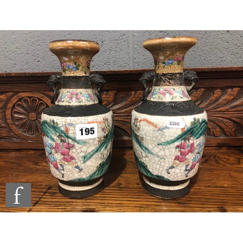 195 - A pair of 20th century Chinese crackle ware vases painted with warriors and figures in landscape sce... 