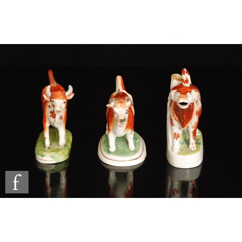 114 - Two late 19th Century cow creamers and covers, both with brown sponged decoration, largest height 15... 