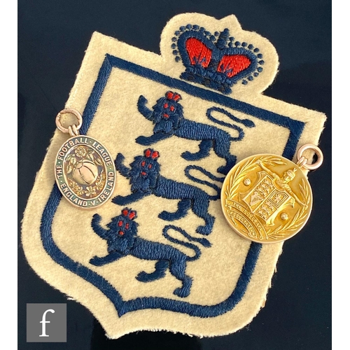 1701 - An F.A. international debut medal awarded to Tom Grosvenor of Birmingham City for the match England ... 