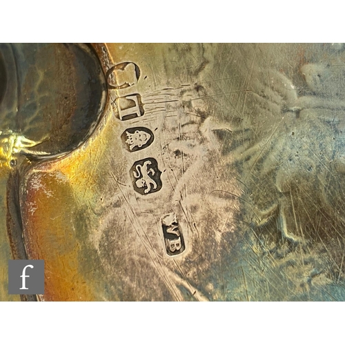 366 - A George III hallmarked silver circular salver with raised acanthus leaf border encompassing later f... 