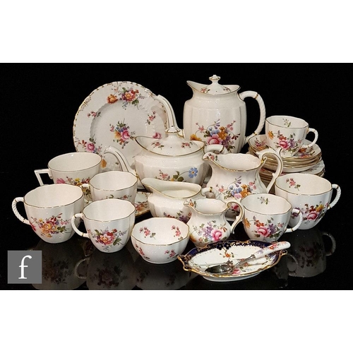 54 - A collection of Royal Crown Derby Derby Posies teawares comprising a coffee pot, a teapot, three bre... 