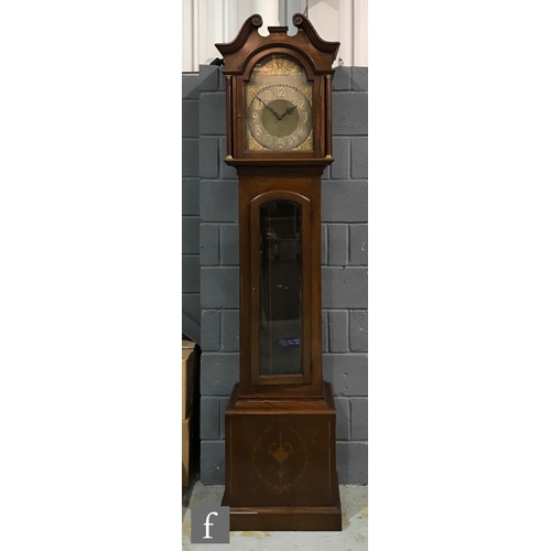 586 - An Edwardian mahogany longcase clock, the Arabic arch dial with matted centre, spandrels and eight d... 