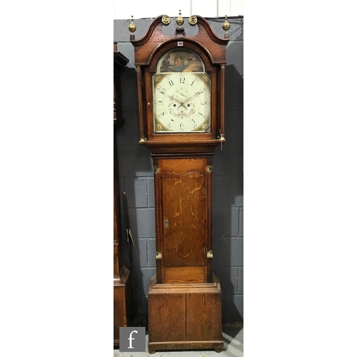 587 - An early 19th Century oak longcase clock with an eight day movement striking on a bell, the case wit... 