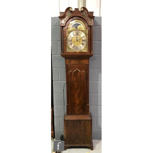 592 - A George III mahogany longcase clock with a later associated eight-day movement striking on a bell, ... 