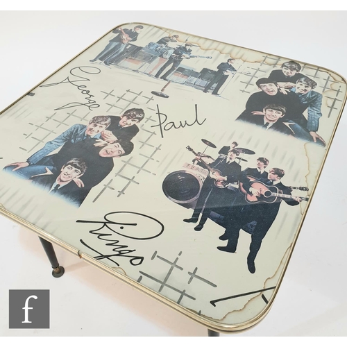 749 - An original 1960s Beatles table, the splayed black legs with gilt edged plastic square top with prin... 