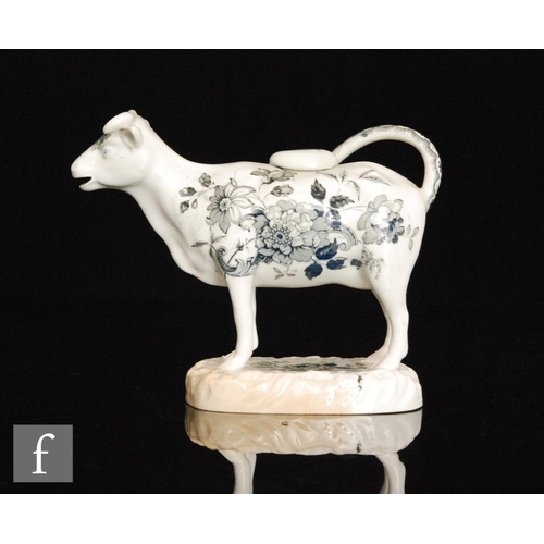 87 - A 19th Century Welsh pearlware cow creamer and cover, possibly Glamorgan, with black and white trans... 