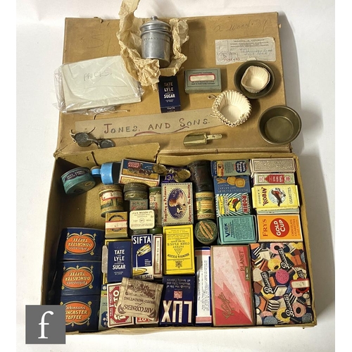 1112 - A collection of early 20th Century packaging, mostly miniature sample tins and similar, collated to ... 