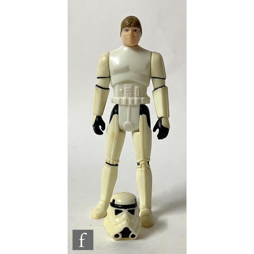 1118 - A Kenner Star Wars 3 3/4 inch Luke Skywalker in Imperial Stormtrooper Outfit action figure with helm... 