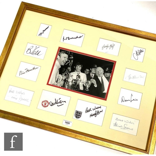 1695 - A Manchester United 1968 European Cup winners team photo with central photograph of George Best and ... 