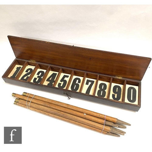 1702 - An early set of 20th Century cricket score numbers contained in a hinged wooden box and a set of stu... 