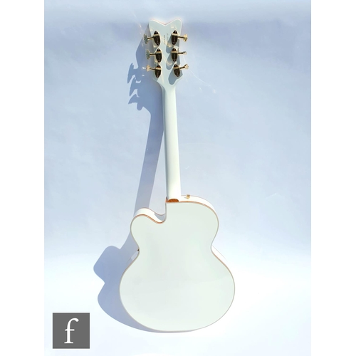 695 - A Gretsch 'White Falcon' semi-acoustic guitar, model number G6136T, serial number JT15030867, white ... 