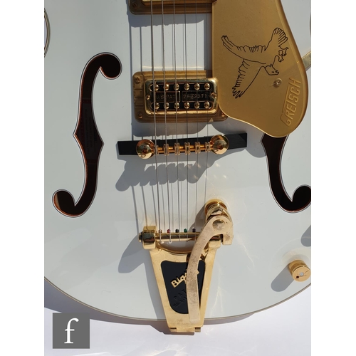 695 - A Gretsch 'White Falcon' semi-acoustic guitar, model number G6136T, serial number JT15030867, white ... 