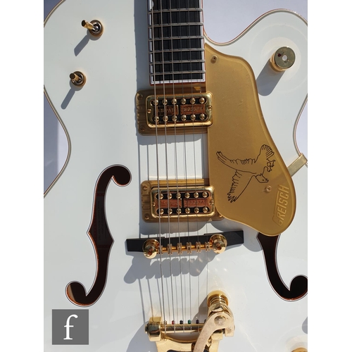 695 - A Gretsch 'White Falcon' semi-acoustic guitar, model number G6136T, serial number JT15030867, white ... 