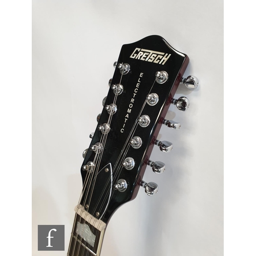 696 - A Gretsch Sunburst 12-string semi-acoustic guitar, serial number KS15023750 made in Korea, model num... 