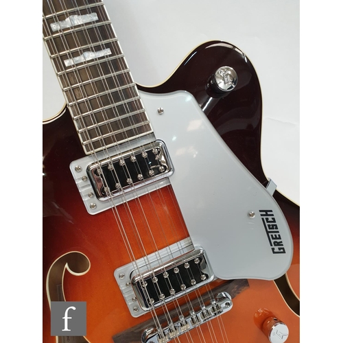 696 - A Gretsch Sunburst 12-string semi-acoustic guitar, serial number KS15023750 made in Korea, model num... 