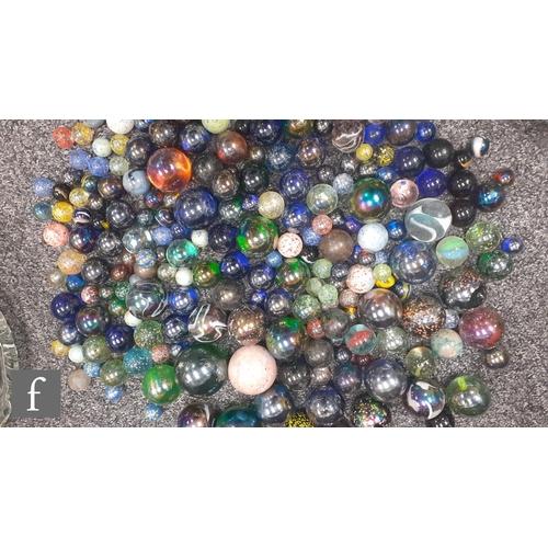 311 - 1 - A collection of glass marbles, to include confetti, mica, mirror glaze and iridescent examples, ... 