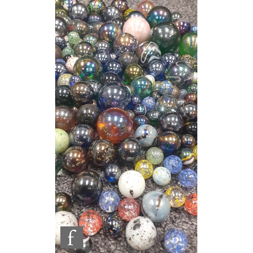 311 - 1 - A collection of glass marbles, to include confetti, mica, mirror glaze and iridescent examples, ... 