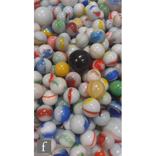 312 - 2 - A large quantity of various glass opaque marbles, to include solid and oxblood examples, of vary... 