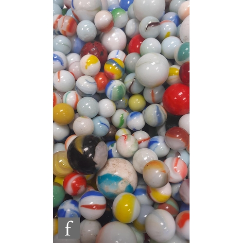 312 - 2 - A large quantity of various glass opaque marbles, to include solid and oxblood examples, of vary... 