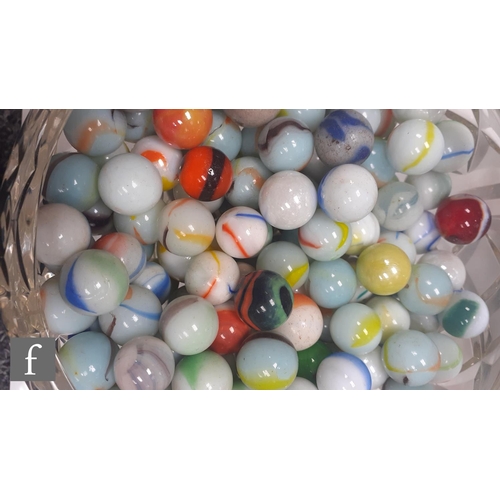 312 - 2 - A large quantity of various glass opaque marbles, to include solid and oxblood examples, of vary... 