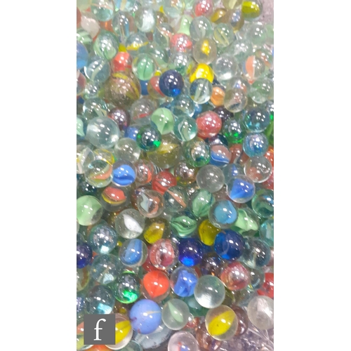 315 - A large collection of various glass marbles, to include mainly swirl examples, lots with pontil mark... 