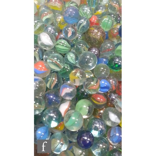 315 - A large collection of various glass marbles, to include mainly swirl examples, lots with pontil mark... 