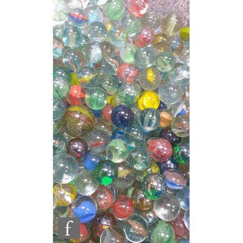 315 - A large collection of various glass marbles, to include mainly swirl examples, lots with pontil mark... 