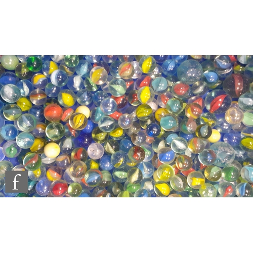 316 - A large collection of various glass marbles, mainly swirl examples of varying colour and size, lots ... 