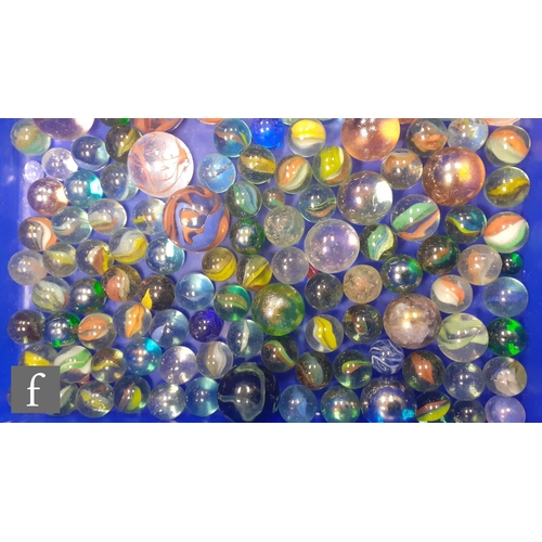 318 - A collection of glass marbles, mostly large size, of varying swirl design and differing colours, lot... 