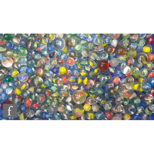 319 - A large collection of various glass marbles, to include swirl, opaque examples of varying colour and... 